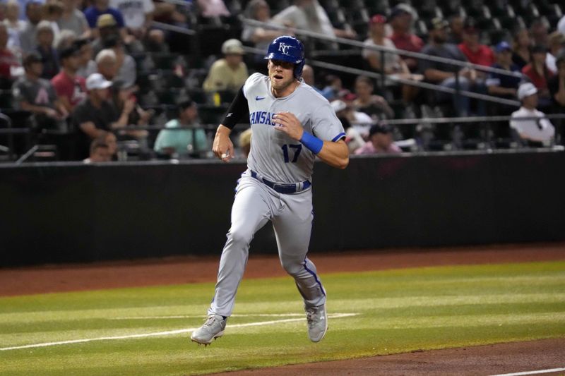 Apr 25, 2023; Phoenix, Arizona, USA; Kansas City Royals right fielder Hunter Dozier (17) rounds third base and scores a run against the Arizona Diamondbacks the during the fourth inning at Chase Field. Mandatory Credit: Joe Camporeale-USA TODAY Sports