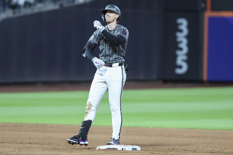 May 24, 2025; New York City, New York, USA;  New York Mets third baseman Brett Baty (7) gestures after hitting an RBI double in the eighth inning against the Los Angeles Dodgers at Citi Field. Mandatory Credit: Wendell Cruz-Imagn Images