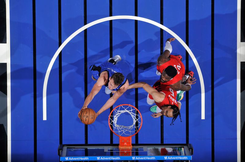 ORLANDO, FL - APRIL 1: Franz Wagner #22 of the Orlando Magic drives to the basket during the game against the Portland Trail Blazers on April 1, 2024 at Kia Center in Orlando, Florida. NOTE TO USER: User expressly acknowledges and agrees that, by downloading and or using this photograph, User is consenting to the terms and conditions of the Getty Images License Agreement. Mandatory Copyright Notice: Copyright 2024 NBAE (Photo by Fernando Medina/NBAE via Getty Images)