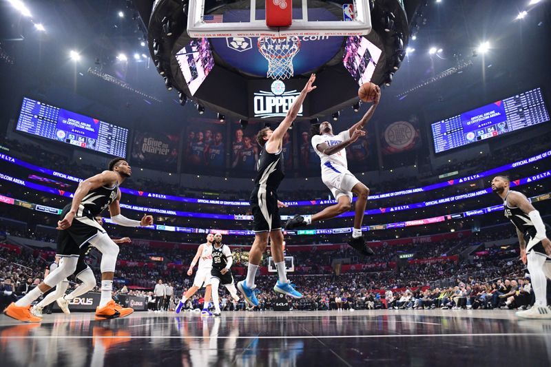 LOS ANGELES, CA - MARCH 10: Bones Hyland #5 of the LA Clippers shoots the ball during the game against the Milwaukee Bucks on March 10, 2024 at Crypto.Com Arena in Los Angeles, California. NOTE TO USER: User expressly acknowledges and agrees that, by downloading and/or using this Photograph, user is consenting to the terms and conditions of the Getty Images License Agreement. Mandatory Copyright Notice: Copyright 2024 NBAE (Photo by Adam Pantozzi/NBAE via Getty Images)