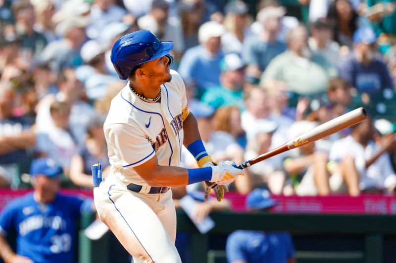 Aug 27, 2023; Seattle, Washington, USA; Seattle Mariners center fielder Julio Rodriguez (44) hits a two-run home run against the Kansas City Royals during the fifth inning at T-Mobile Park. Mandatory Credit: Joe Nicholson-USA TODAY Sports