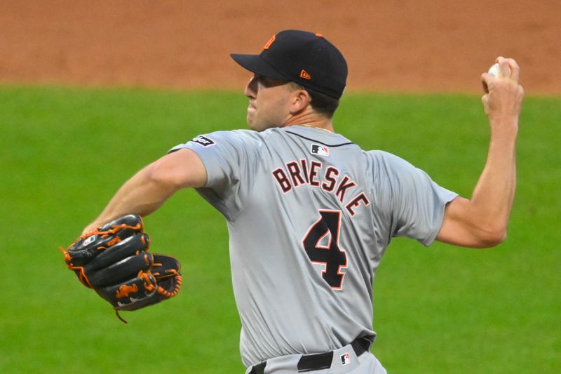 Jul 24, 2024; Cleveland, Ohio, USA; Detroit Tigers relief pitcher Beau Brieske (4) delivers a pitch in the eighth inning against the Cleveland Guardians at Progressive Field. Mandatory Credit: David Richard-USA TODAY Sports