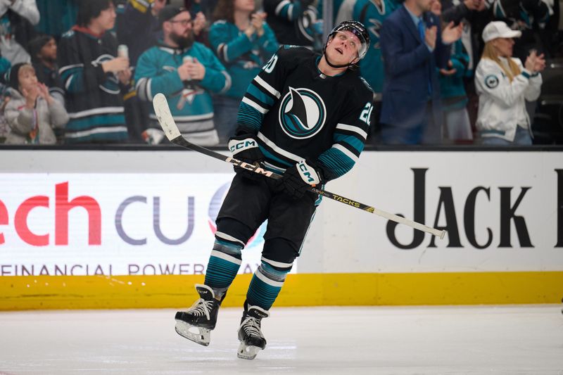 Mar 9, 2024; San Jose, California, USA: San Jose Sharks left wing Fabian Zetterlund (20) reacts after assisting on a goal scored against the Ottawa Senators during the first period at SAP Center at San Jose. Mandatory Credit: Robert Edwards-USA TODAY Sports