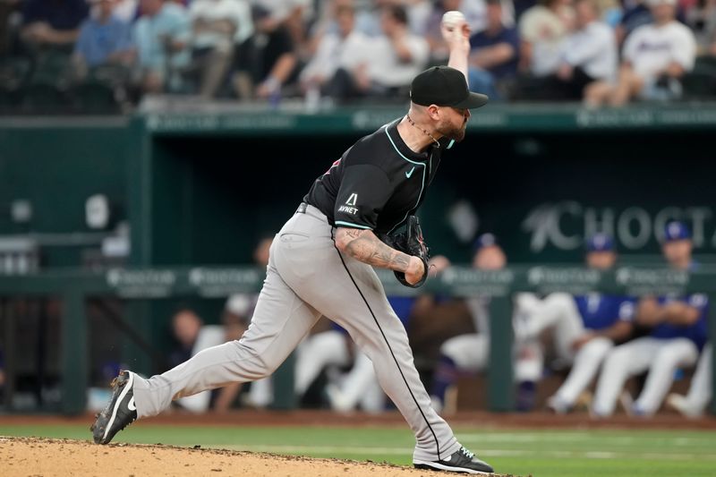 May 29, 2024; Arlington, Texas, USA;  Arizona Diamondbacks relief pitcher Logan Allen (22) delivers a pitch to the Texas Rangers during the eighth inning at Globe Life Field. Mandatory Credit: Jim Cowsert-USA TODAY Sports