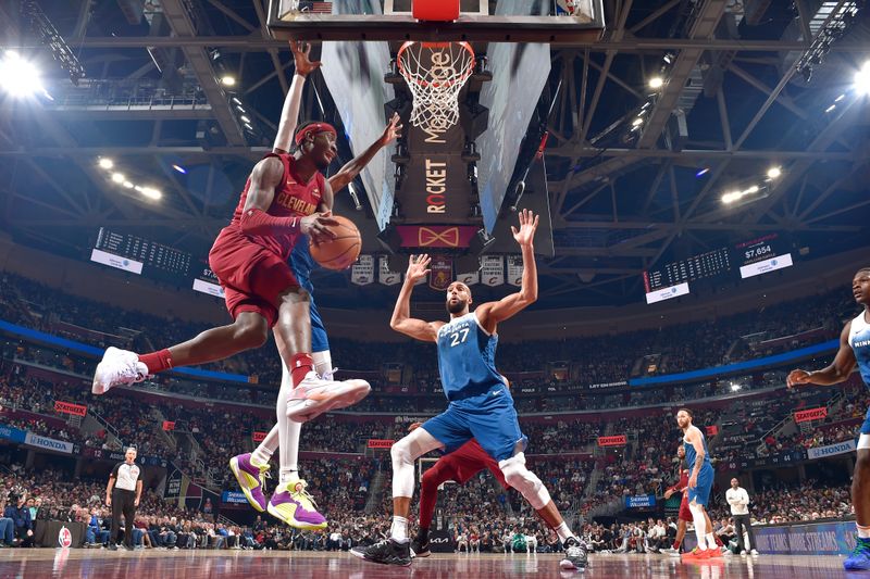 CLEVELAND, OH - MARCH 8: Caris LeVert #3 of the Cleveland Cavaliers handles the ball during the game against the Minnesota Timberwolves on March 8, 2024 at Rocket Mortgage FieldHouse in Cleveland, Ohio. NOTE TO USER: User expressly acknowledges and agrees that, by downloading and/or using this Photograph, user is consenting to the terms and conditions of the Getty Images License Agreement. Mandatory Copyright Notice: Copyright 2024 NBAE (Photo by David Liam Kyle/NBAE via Getty Images)