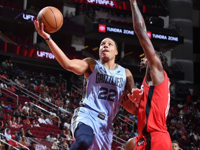 HOUSTON, TX - OCTOBER 25: Desmond Bane #22 of the Memphis Grizzlies drives to the basket during the game against the Houston Rockets on October 25, 2024 at the Toyota Center in Houston, Texas. NOTE TO USER: User expressly acknowledges and agrees that, by downloading and or using this photograph, User is consenting to the terms and conditions of the Getty Images License Agreement. Mandatory Copyright Notice: Copyright 2024 NBAE (Photo by Logan Riely/NBAE via Getty Images)