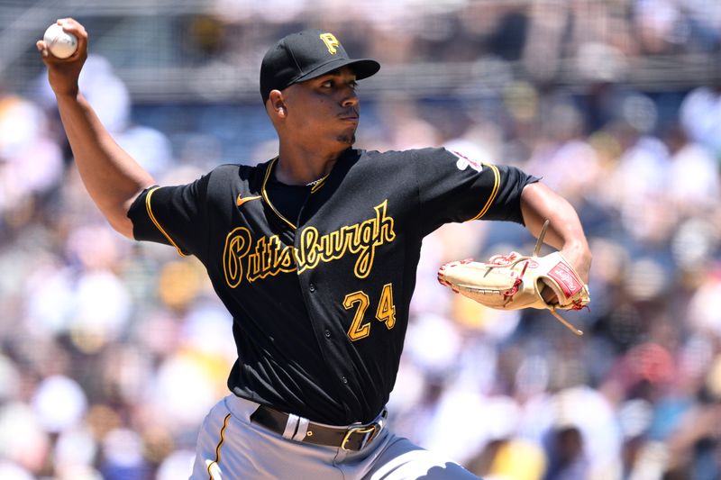 Jul 26, 2023; San Diego, California, USA; Pittsburgh Pirates starting pitcher Johan Oviedo (24) throws a pitch against the San Diego Padres during the first inning at Petco Park. Mandatory Credit: Orlando Ramirez-USA TODAY Sports