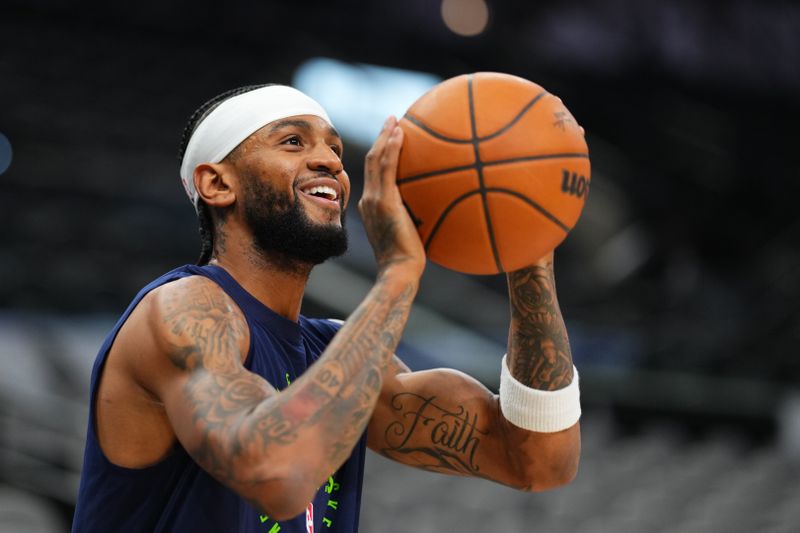 SAN ANTONIO, TX - NOVEMBER 2: Nickeil Alexander-Walker #9 of the Minnesota Timberwolves warms up before the game against the San Antonio Spurs on November 2, 2024 at the Frost Bank Center in San Antonio, Texas. NOTE TO USER: User expressly acknowledges and agrees that, by downloading and or using this photograph, user is consenting to the terms and conditions of the Getty Images License Agreement. Mandatory Copyright Notice: Copyright 2024 NBAE (Photos by Cooper Neill/NBAE via Getty Images)