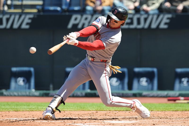 Apr 27, 2025; Cleveland, Ohio, USA; Boston Red Sox left fielder Jarren Duran (16) hits a single during the second inning against the Cleveland Guardians at Progressive Field. Mandatory Credit: Ken Blaze-Imagn Images