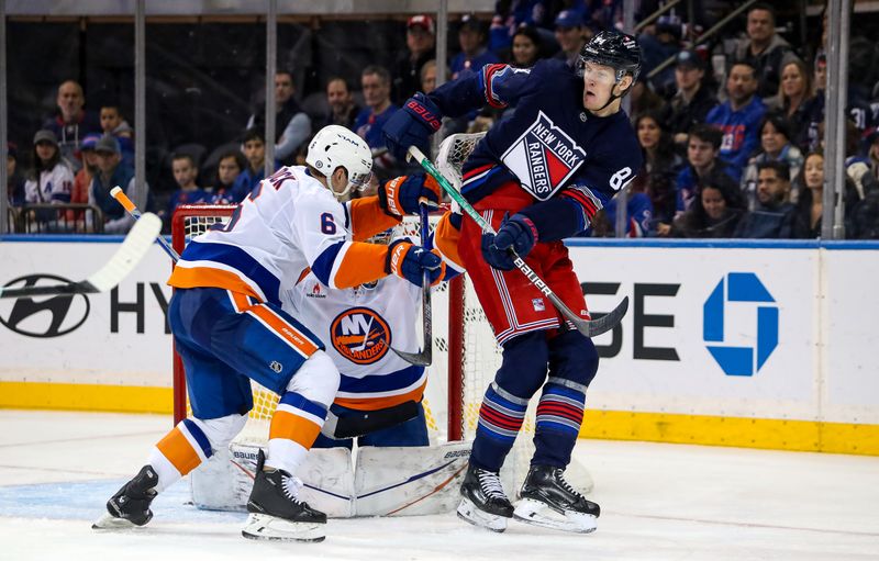 Nov 3, 2024; New York, New York, USA; New York Rangers center Adam Edstrom (84) is defended by New York Islanders defenseman Ryan Pulock (6) during the third period at Madison Square Garden. Mandatory Credit: Danny Wild-Imagn Images