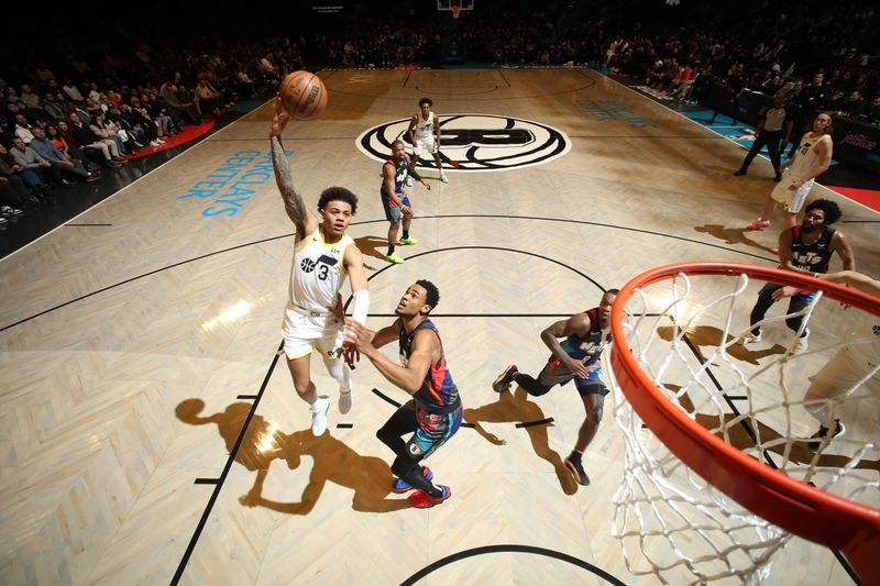 BROOKLYN, NY - JANUARY 29: Keyonte George #3 of the Utah Jazz drives to the basket during the game against the Brooklyn Nets on January 29, 2024 at Barclays Center in Brooklyn, New York. NOTE TO USER: User expressly acknowledges and agrees that, by downloading and or using this Photograph, user is consenting to the terms and conditions of the Getty Images License Agreement. Mandatory Copyright Notice: Copyright 2024 NBAE (Photo by Nathaniel S. Butler/NBAE via Getty Images)