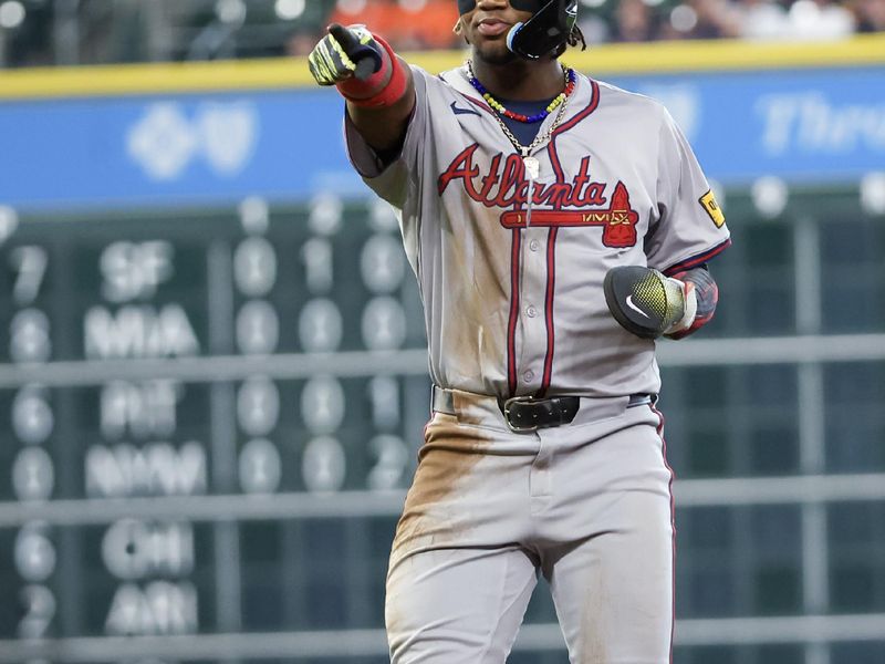 Apr 17, 2024; Houston, Texas, USA; Atlanta Braves right fielder Ronald Acuna Jr. (13) points to the first base umpire for a balk call against Houston Astros pitcher J.P. France (68) in the first inning at Minute Maid Park. Mandatory Credit: Thomas Shea-USA TODAY Sports