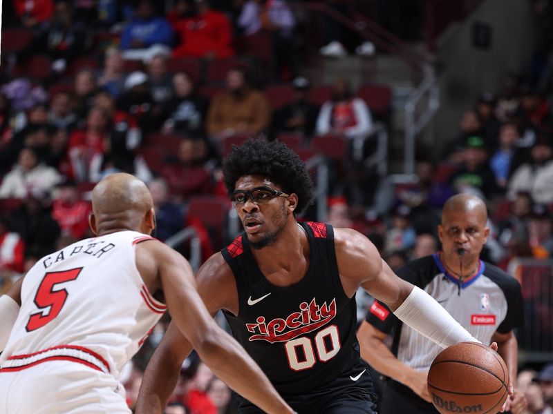 CHICAGO, IL - MARCH 18:  Scoot Henderson #00 of the Portland Trail Blazers handles the ball during the game against the Chicago Bulls on March 18, 2024 at United Center in Chicago, Illinois. NOTE TO USER: User expressly acknowledges and agrees that, by downloading and or using this photograph, User is consenting to the terms and conditions of the Getty Images License Agreement. Mandatory Copyright Notice: Copyright 2024 NBAE (Photo by Jeff Haynes/NBAE via Getty Images)