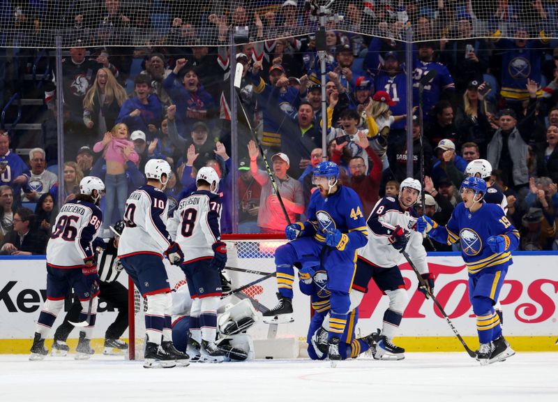 Oct 28, 2025; Buffalo, New York, USA;  Buffalo Sabres center Josh Dunne (44) reacts after scoring his first career NHL goal during the third period against the Columbus Blue Jackets at KeyBank Center. Mandatory Credit: Timothy T. Ludwig-Imagn Images