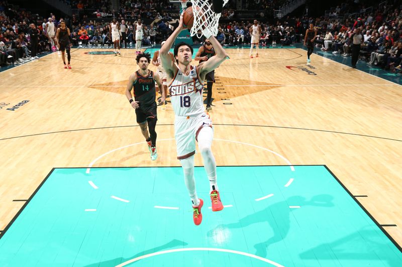 WASHINGTON, DC -? FEBRUARY 4: Yuta Watanabe #18 of the Phoenix Suns drives to the basket during the game against the Washington Wizards on February 4, 2024 at Capital One Arena in Washington, DC. NOTE TO USER: User expressly acknowledges and agrees that, by downloading and or using this Photograph, user is consenting to the terms and conditions of the Getty Images License Agreement. Mandatory Copyright Notice: Copyright 2024 NBAE (Photo by Kenny Giarla/NBAE via Getty Images)