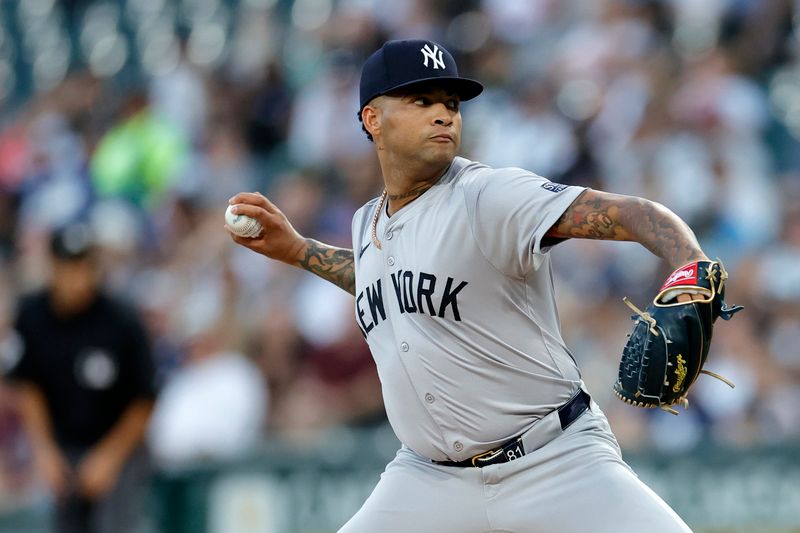 Aug 12, 2024; Chicago, Illinois, USA; New York Yankees pitcher Luis Gil (81) throws pitch against the Chicago White Sox during the first inning at Guaranteed Rate Field. Mandatory Credit: Kamil Krzaczynski-USA TODAY Sports