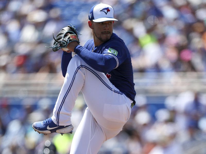 Mar 12, 2024; Dunedin, Florida, USA;  Toronto Blue Jays starting pitcher Jose Berrios (17) throws a pitch against the New York Yankees in the first inning at TD Ballpark. Mandatory Credit: Nathan Ray Seebeck-USA TODAY Sports