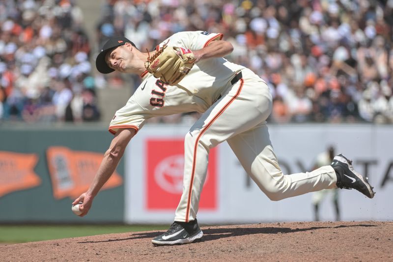 Jun 7, 2025; San Francisco, California, USA;  San Francisco Giants pitcher Tyler Rogers (71) throws a pitch against the Atlanta Braves during the ninth inning at Oracle Park. Mandatory Credit: Ed Szczepanski-Imagn Images