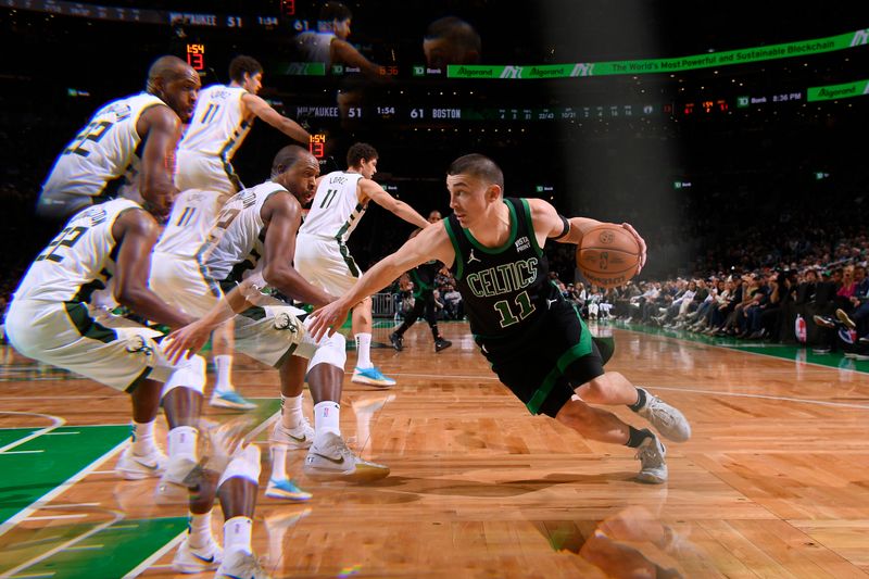 BOSTON, MA - MARCH 20: Payton Pritchard #11 of the Boston Celtics handles the ball during the game against the Milwaukee Bucks on March 20, 2024 at the TD Garden in Boston, Massachusetts. NOTE TO USER: User expressly acknowledges and agrees that, by downloading and or using this photograph, User is consenting to the terms and conditions of the Getty Images License Agreement. Mandatory Copyright Notice: Copyright 2024 NBAE  (Photo by Brian Babineau/NBAE via Getty Images)