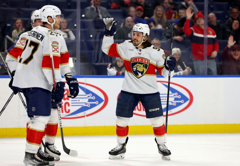 Feb 15, 2024; Buffalo, New York, USA;  Florida Panthers left wing Ryan Lomberg (94) celebrates his goal with teammates during the third period against the Buffalo Sabres at KeyBank Center. Mandatory Credit: Timothy T. Ludwig-USA TODAY Sports