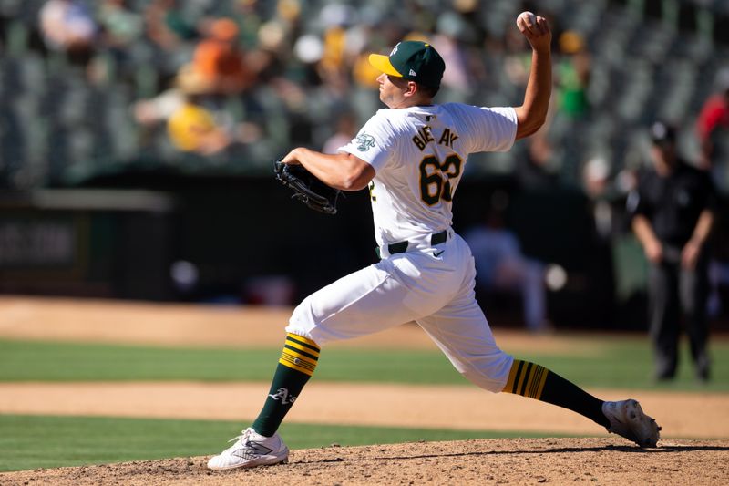 Sep 8, 2024; Oakland, California, USA; Oakland Athletics pitcher Brandon Bielak (62) delivers a pitch against the Detroit Tigers during the ninth inning at Oakland-Alameda County Coliseum. Mandatory Credit: D. Ross Cameron-Imagn Images