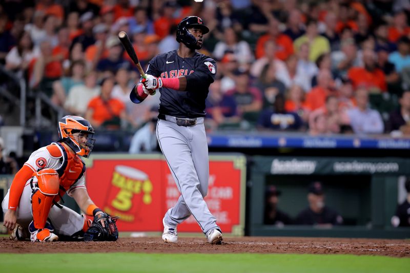 Apr 30, 2024; Houston, Texas, USA; Cleveland Guardians designated hitter Estevan Florial (90) hits a three-run home run to right field against the Houston Astros during the sixth inning at Minute Maid Park. Mandatory Credit: Erik Williams-USA TODAY Sports