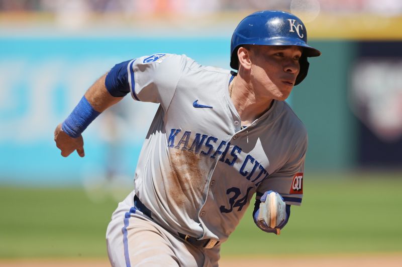 Jun 6, 2024; Cleveland, Ohio, USA; Kansas City Royals catcher Freddy Fermin (34) rounds third base en route to scoring during the sixth inning against the Cleveland Guardians at Progressive Field. Mandatory Credit: Ken Blaze-USA TODAY Sports