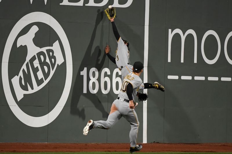 Apr 4, 2023; Boston, Massachusetts, USA;  Pittsburgh Pirates second baseman Ji Hwan Bae (3) makes a catch for an out during the eighth inning against the Boston Red Sox at Fenway Park. Mandatory Credit: Bob DeChiara-USA TODAY Sports