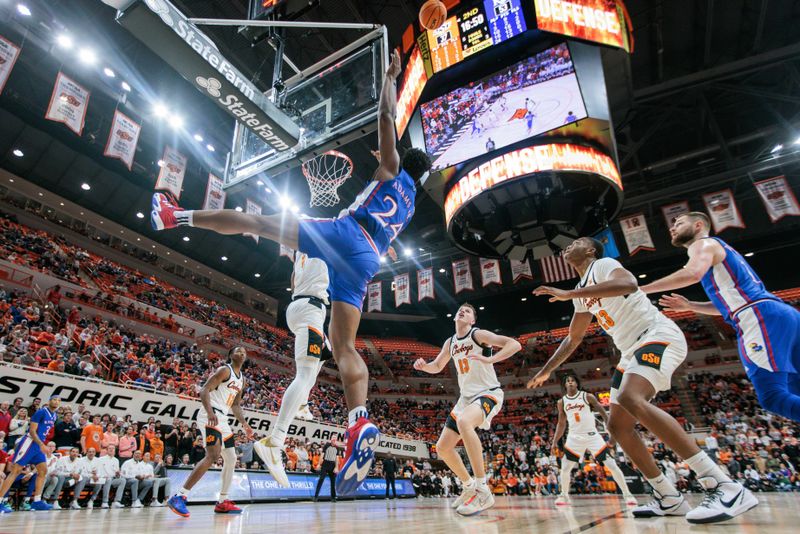 Jan 16, 2024; Stillwater, Oklahoma, USA; Kansas Jayhawks forward K.J. Adams Jr. (24) loses control of the ball going up for a shot during the second half against the Oklahoma State Cowboys at Gallagher-Iba Arena. Mandatory Credit: William Purnell-USA TODAY Sports