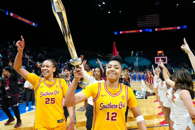 Mar 8, 2024; Las Vegas, NV, USA; USC Trojans guard JuJu Watkins (12) celebrates with USC Trojans guard McKenzie Forbes (25) after the Trojans defeated the UCLA Bruins 80-70 in double overtime at MGM Grand Garden Arena. Mandatory Credit: Stephen R. Sylvanie-USA TODAY Sports