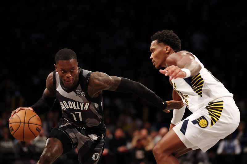 NEW YORK, NEW YORK - DECEMBER 04: Dennis Schroder #17 of the Brooklyn Nets dribbles against Bennedict Mathurin #00 of the Indiana Pacers during the second half at Barclays Center on December 04, 2024 in the Brooklyn borough of New York City. The Nets won 99-90. NOTE TO USER: User expressly acknowledges and agrees that, by downloading and or using this photograph, User is consenting to the terms and conditions of the Getty Images License Agreement. (Photo by Sarah Stier/Getty Images)