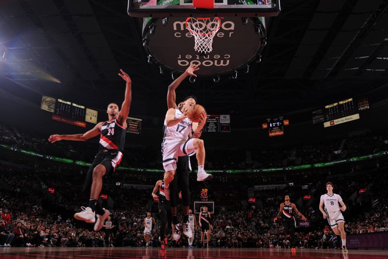 PORTLAND, OR - NOVEMBER 10: Yuki Kawamura #17 of the Memphis Grizzlies shoots the ball during the game against the Portland Trail Blazers on November 10, 2024 at the Moda Center Arena in Portland, Oregon. NOTE TO USER: User expressly acknowledges and agrees that, by downloading and or using this photograph, user is consenting to the terms and conditions of the Getty Images License Agreement. Mandatory Copyright Notice: Copyright 2024 NBAE (Photo by Cameron Browne/NBAE via Getty Images)