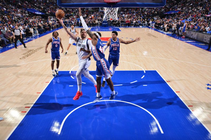 PHILADELPHIA, PA - FEBRUARY 5: Luka Doncic #77 of the Dallas Mavericks drives to the basket during the game against the Philadelphia 76ers  on February 5, 2024 at the Wells Fargo Center in Philadelphia, Pennsylvania NOTE TO USER: User expressly acknowledges and agrees that, by downloading and/or using this Photograph, user is consenting to the terms and conditions of the Getty Images License Agreement. Mandatory Copyright Notice: Copyright 2024 NBAE (Photo by Jesse D. Garrabrant/NBAE via Getty Images)