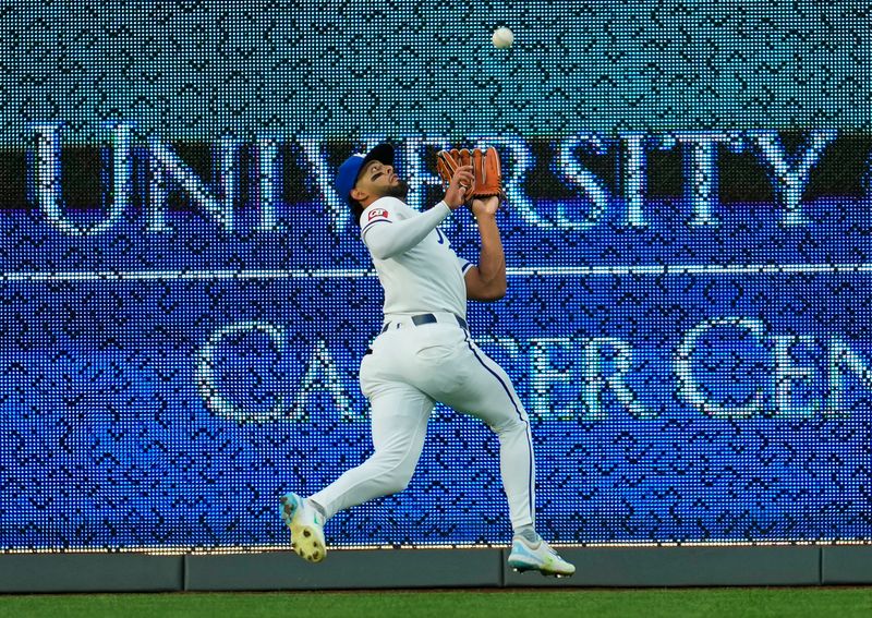 Apr 24, 2024; Kansas City, Missouri, USA; Kansas City Royals outfielder MJ Melendez (1) catches a line drive at the wall during the third inning against the Toronto Blue Jays at Kauffman Stadium. Mandatory Credit: Jay Biggerstaff-USA TODAY Sports