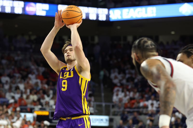 Jan 13, 2024; Auburn, Alabama, USA; LSU Tigers forward Will Baker (9) attempts a free throw during the first half against the Auburn Tigers at Neville Arena. Mandatory Credit: John Reed-USA TODAY Sports