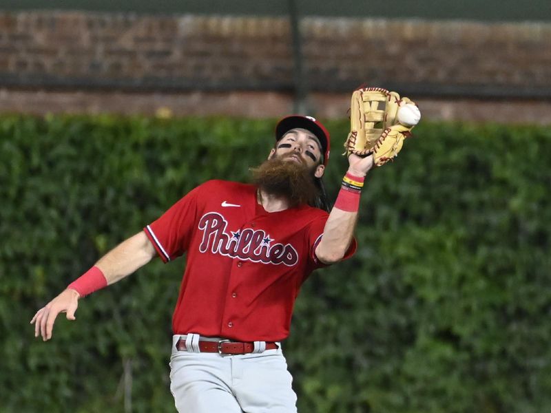 Jun 29, 2023; Chicago, Illinois, USA;  Philadelphia Phillies center fielder Brandon Marsh (16) misses the catch against the Chicago Cubs during the fifth inning at Wrigley Field. Mandatory Credit: Matt Marton-USA TODAY Sports