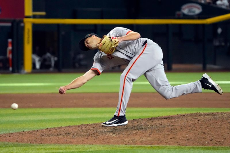 Jun 5, 2024; Phoenix, Arizona, USA;  San Francisco Giants pitcher Tyler Rogers (71) throws against the Arizona Diamondbacks in the eighth inning at Chase Field. Mandatory Credit: Rick Scuteri-USA TODAY Sports