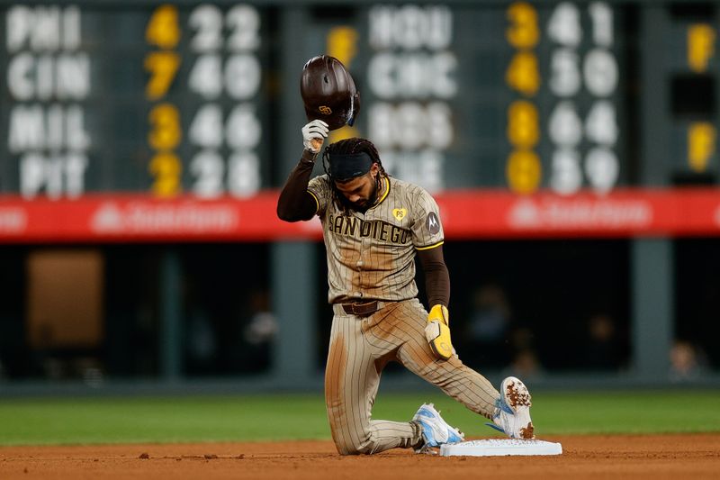 Apr 24, 2024; Denver, Colorado, USA; San Diego Padres right fielder Fernando Tatis Jr. (23) reacts after getting caught stealing second in the seventh inning against the Colorado Rockies at Coors Field. Mandatory Credit: Isaiah J. Downing-USA TODAY Sports