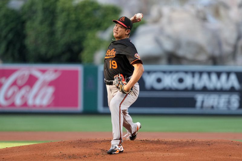 May 9, 2025; Anaheim, California, USA; Baltimore Orioles starting pitcher Tomoyuki Sugano (19) throws in the first inning against the Los Angeles Angels at Angel Stadium. Mandatory Credit: Kirby Lee-Imagn Images