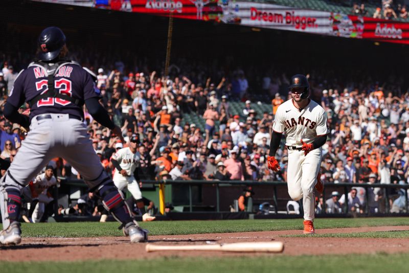 Sep 13, 2023; San Francisco, California, USA; San Francisco Giants catcher Patrick Bailey (14) scores the winning run during the tenth inning against the Cleveland Guardians at Oracle Park. Mandatory Credit: Sergio Estrada-USA TODAY Sports