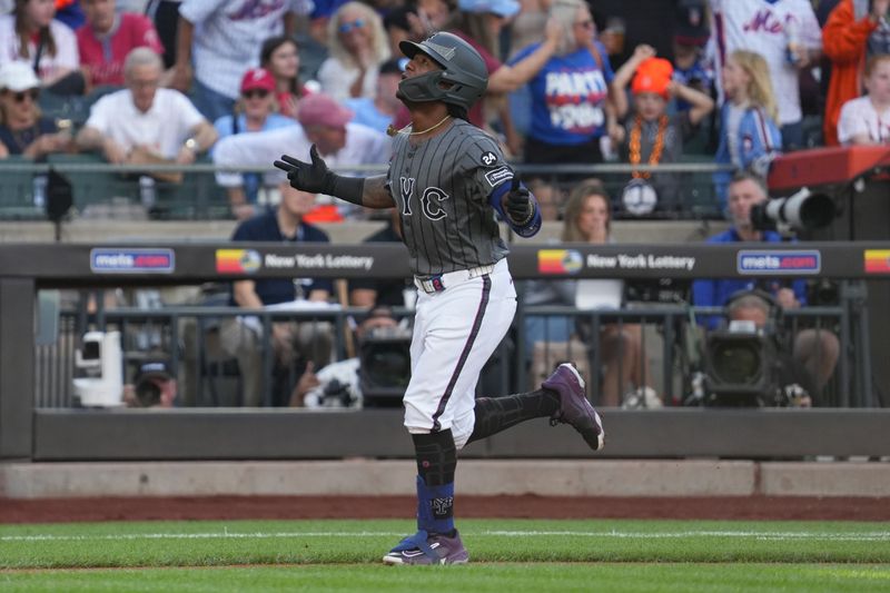 Sep 21, 2024; New York City, New York, USA; New York Mets shortstop Luisangel Acuña (2) approaches home plate after hitting a home run during the second inning against the Philadelphia Phillies at Citi Field. Mandatory Credit: Lucas Boland-Imagn Images