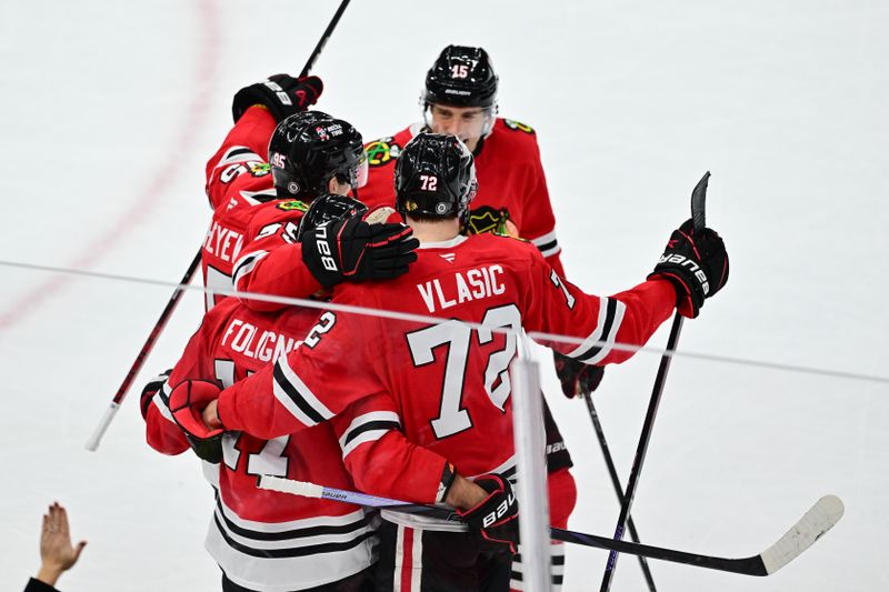 Nov 21, 2024; Chicago, Illinois, USA; Chicago Blackhawks left wing Nick Foligno (17) celebrates his empty net goal with teammates against the Florida Panthers during the third period at the United Center. Mandatory Credit: Daniel Bartel-Imagn Images