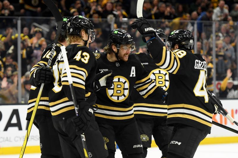 Mar 19, 2024; Boston, Massachusetts, USA;  Boston Bruins right wing David Pastrnak (88) celebrates his goal with his teammates during the first period against the Ottawa Senators at TD Garden. Mandatory Credit: Bob DeChiara-USA TODAY Sports