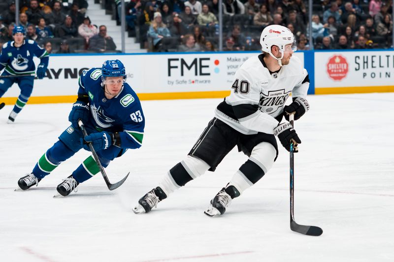 Mar 26, 2026; Vancouver, British Columbia, CAN; Vancouver Canucks forward Marco Rossi (93) pursues Los Angeles Kings forward Joel Armia (40) in the second period at Rogers Arena. Mandatory Credit: Bob Frid-Imagn Images
