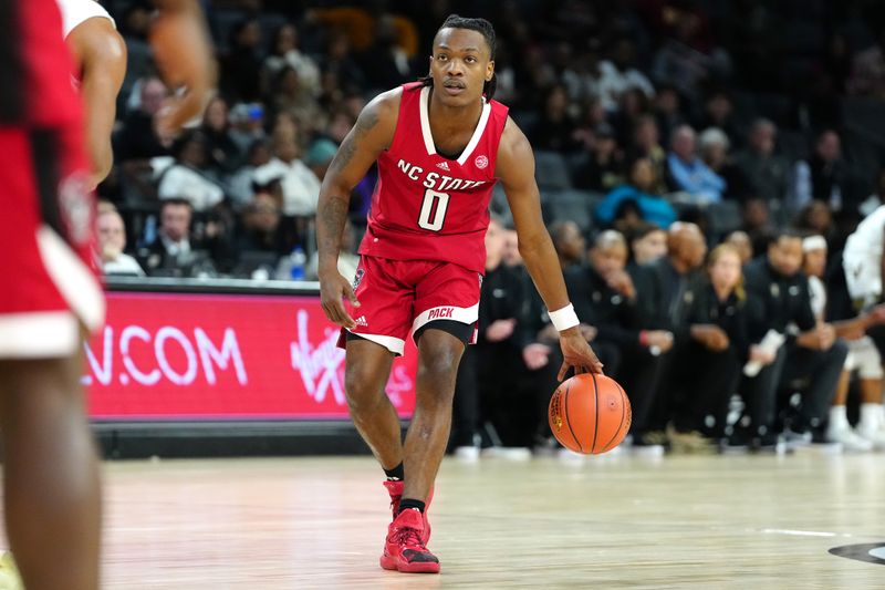 Nov 23, 2023; Las Vegas, Nevada, USA; North Carolina State Wolfpack guard DJ Horne (0) dribbles against the Vanderbilt Commodores during the second half at Michelob Ultra Arena. Mandatory Credit: Stephen R. Sylvanie-USA TODAY Sports