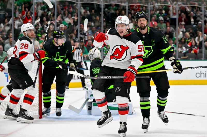 Mar 14, 2024; Dallas, Texas, USA; New Jersey Devils left wing Erik Haula (56) celebrates after he scores a goal as Dallas Stars left wing Jamie Benn (14) looks on during the first period at the American Airlines Center. Mandatory Credit: Jerome Miron-USA TODAY Sports