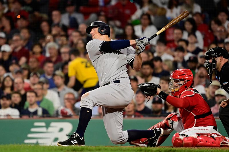 Sep 14, 2023; Boston, Massachusetts, USA; New York Yankees first baseman DJ LeMahieu (26) hits a base hit against the Boston Red Sox during the sixth inning at Fenway Park. Mandatory Credit: Eric Canha-USA TODAY Sports