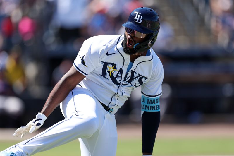 Apr 13, 2025; Tampa, Florida, USA; Tampa Bay Rays third baseman Junior Caminero (13) celebrates after hitting a three run home run against the Atlanta Braves in the sixth inning at George M. Steinbrenner Field. Mandatory Credit: Nathan Ray Seebeck-Imagn Images
