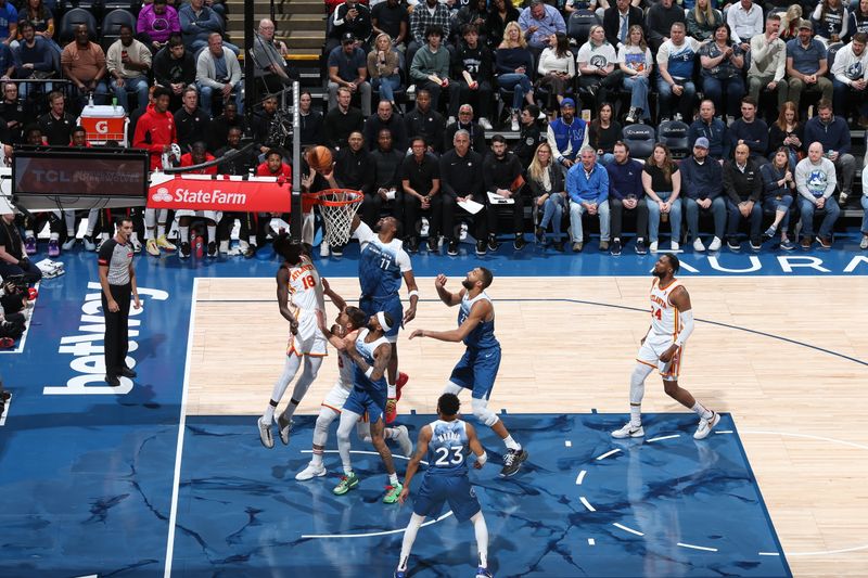 MINNEAPOLIS, MN -  APRIL 12: Naz Reid #11 of the Minnesota Timberwolves handles the ball during the game against the Atlanta Hawks on April 12, 2024 at Target Center in Minneapolis, Minnesota. NOTE TO USER: User expressly acknowledges and agrees that, by downloading and or using this Photograph, user is consenting to the terms and conditions of the Getty Images License Agreement. Mandatory Copyright Notice: Copyright 2024 NBAE (Photo by David Sherman/NBAE via Getty Images)