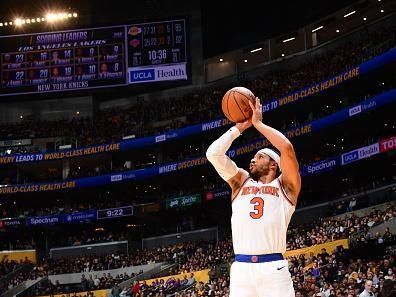 LOS ANGELES, CA - DECEMBER 18:  Josh Hart #3 of the New York Knicks shoots a three point basket during the game  on December 18, 2023 at Crypto.Com Arena in Los Angeles, California. NOTE TO USER: User expressly acknowledges and agrees that, by downloading and/or using this Photograph, user is consenting to the terms and conditions of the Getty Images License Agreement. Mandatory Copyright Notice: Copyright 2023 NBAE (Photo by Adam Pantozzi/NBAE via Getty Images)